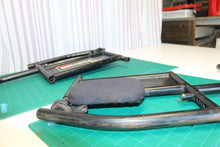 pair of arm rest brackets with hip pads for a 21st Century Scientific Inc Bounde
