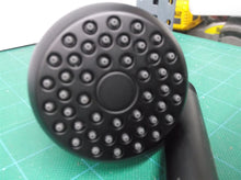 1.75 gpm black Fixed Showerhead 2.5" Diameter new but scratches no box