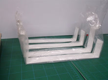 lot of 4 7-3/4" brackets for holding shelves