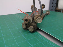 lot of 4 10.5" x 3/8" bolts with nuts, washers, and rubber Rollers 5-3/4"x1