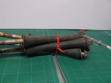 lot of 4 10.5" x 3/8" bolts with nuts, washers, and rubber Rollers 5-3/4"x1
