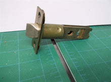 Kwikset Backset Door latch with Square Corner Faceplate Antique Brass