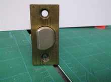 Kwikset Backset Door latch with Square Corner Faceplate Antique Brass