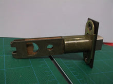 Kwikset Backset Door latch with Square Corner Faceplate Antique Brass