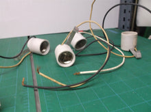 4 White E26 Porcelain Socket With 1 Inch Side Snap In Bracket
