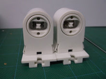 2 HH Fluorescent LH0165 (1-810H) tombstone lamp holder is a nonshunted, stationa