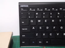 Arteck HW193 *NO RECEIVER* Wireless Keyboard Takes Charge and Powers On
