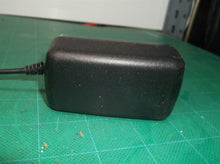 Kuanten Ac Adaptor Model: KT241240100us. 24V=1A