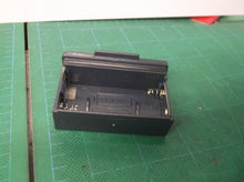 Battery holder from a Melnor - Electronic Garden Hose Watering Timer