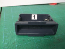 Battery holder from a Melnor - Electronic Garden Hose Watering Timer