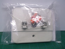 off White plastic led exit sign mount with wire nuts and metal mounting plate