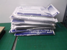 First Mark Disposable White Poly Apron 46" x 28" - Pack of 25