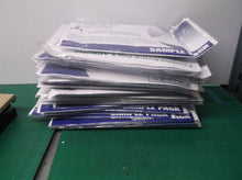 First Mark Disposable White Poly Apron 46" x 28" - Pack of 25