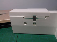 white trim with hinged pannel for sewing machine