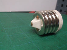 WE LH0404 Mogul E39 to Medium base E26 4kv pulse rated lampholder reducer