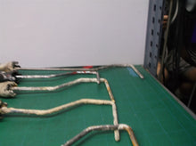 lot of 5 paint roller frames 2 12inches, 2 12 1/2 inches, 1 16 imches