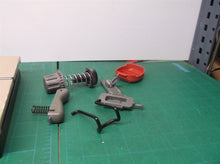 misc buttons, springs, cover, and hook for craftsman cmcst900