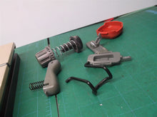 misc buttons, springs, cover, and hook for craftsman cmcst900