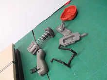 misc buttons, springs, cover, and hook for craftsman cmcst900