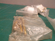 lot of tolet bolts with white caps