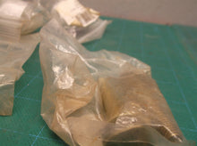 lot of tolet bolts with white caps