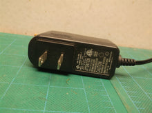 xh0900-1000l adapter 9v dc @ 1a