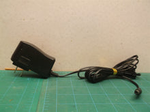 xh0900-1000l adapter 9v dc @ 1a