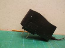 xh0900-1000l adapter 9v dc @ 1a