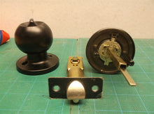 Assorted unbranded door knob parts black no keys