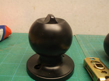 Assorted unbranded door knob parts black no keys