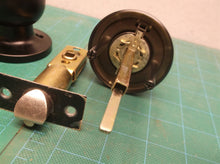 Assorted unbranded door knob parts black no keys