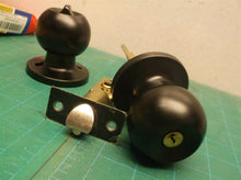 Assorted unbranded door knob parts black no keys