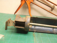 2 caulking guns