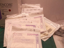 70+ pair encore latex textured surgical gloves size 6 exp 5-30-22