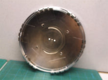 Cadillac 7 3/4 inch chrome cap off a rim