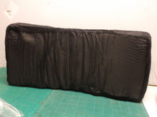 2 hump black pillow