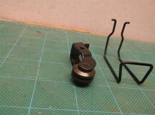 TTI312418002 ASSEMBLY ROLLER & TTI635565002 WIRE;GUARD off a PBLJS01 18 Volt Bru