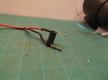 Switch group with battery connector off a Ryobi P2008VNM 18 Volt String Trimmer/