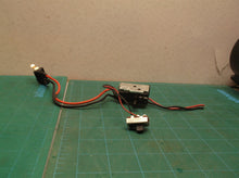 Switch group with battery connector off a Ryobi P2008VNM 18 Volt String Trimmer/
