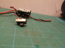 Switch group with battery connector off a Ryobi P2008VNM 18 Volt String Trimmer/