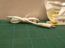 set of brushes and charge cable for a triple head toothbrush kids electric ut3