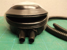 Hand pump for inflation or deflation with nozzle adapters