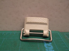 White battery door latch for a Ryobi RY120350VNM 18 Volt EZCLEAN Power Cleaner