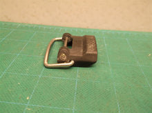 Black battery door latch for a Ryobi RY120350VNM 18 Volt EZCLEAN Power Cleaner