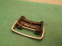 Black battery door latch for a Ryobi RY120350VNM 18 Volt EZCLEAN Power Cleaner