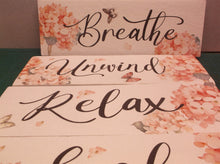 Set of 4 foam signs unwind soak relax breath