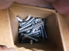 11 boxes of assorted 10-32 bolts