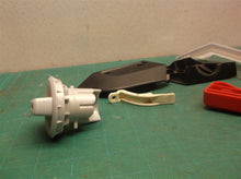 Assorted parts for a Bissell 1797 PowerForce Helix Rewind