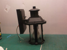 Black wall mount dusk to dawn outdoor light