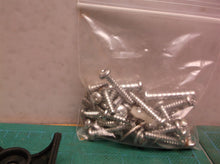 assorted parts for a Snow Joe 24V-SS10-XR 10" Cordless Snow Shovel